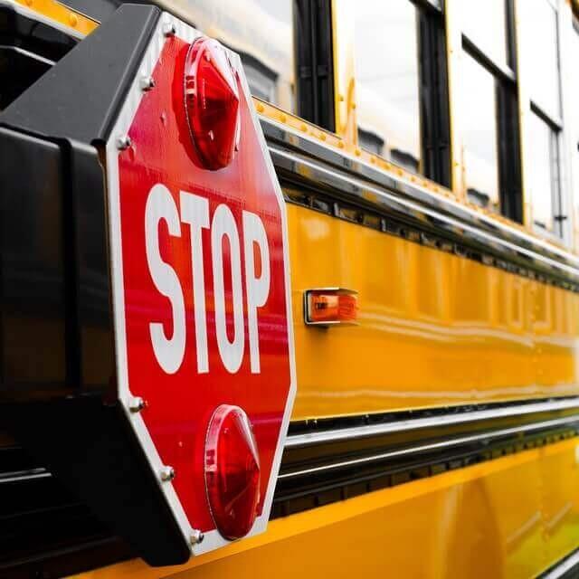closed school bus stop sign